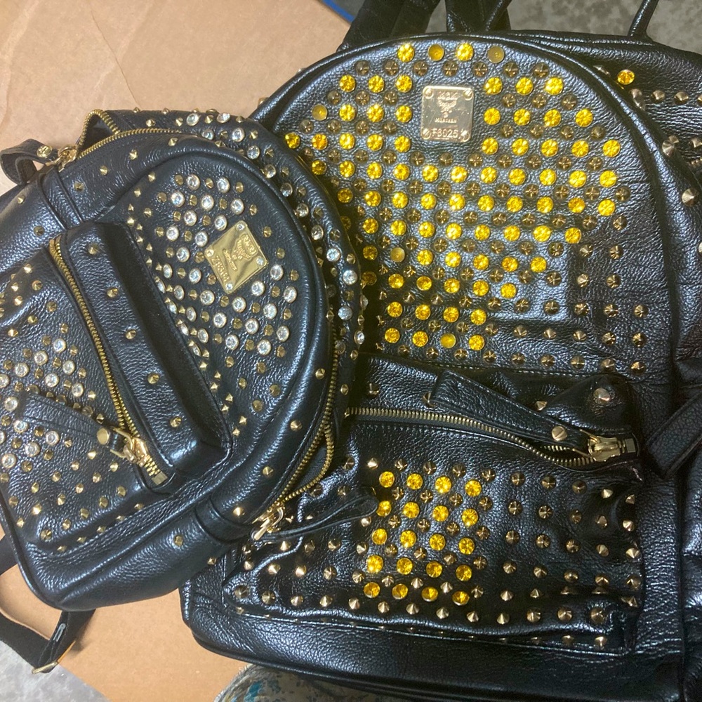 Swarovski yellow crystal studded backpack and it’s mini me! MCM